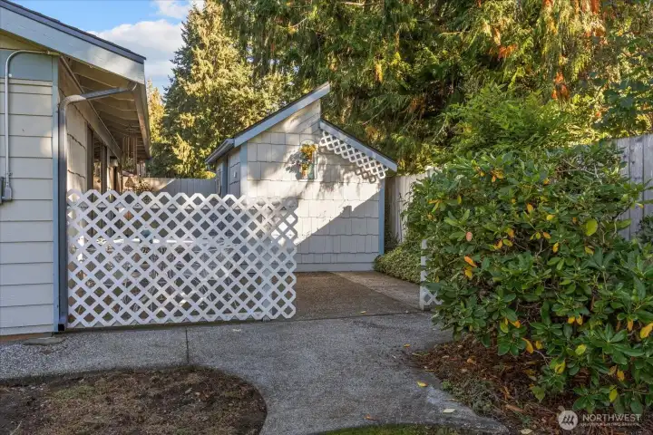 private patio area.  View from side yard