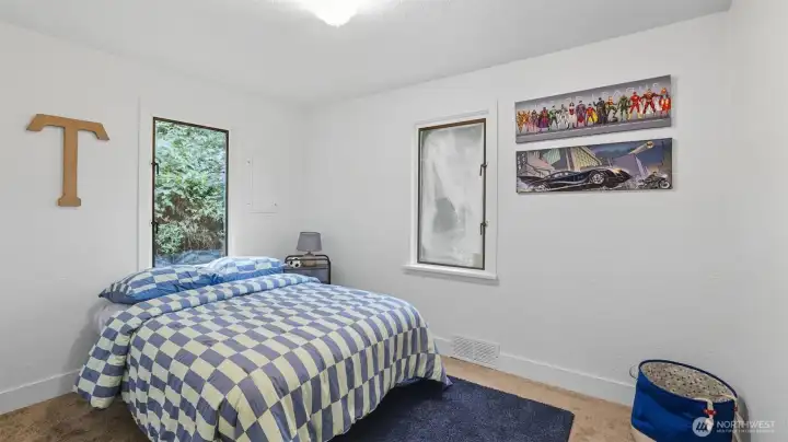 Versatile room perfect for a guest bedroom, office, or play space.