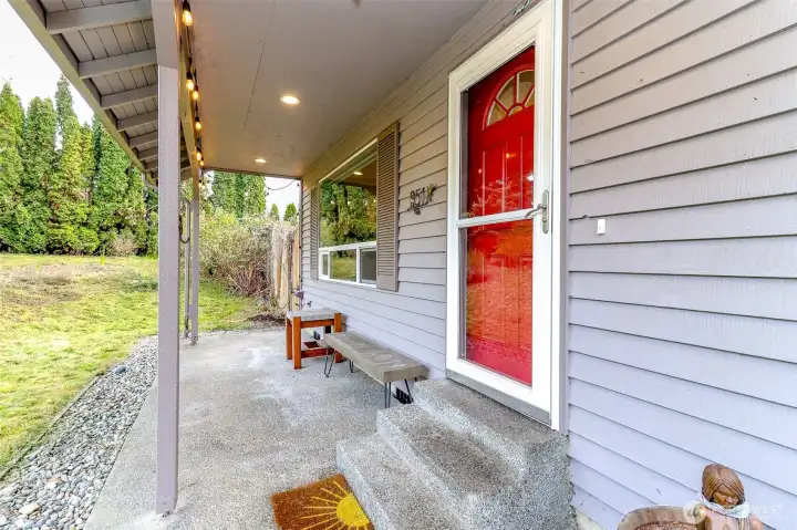A front patio greets you upon making your way to the front door.