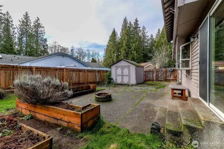 Step outside to find a spacious backyard and patio.