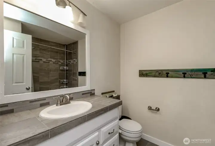 Full bath located on the upper level.