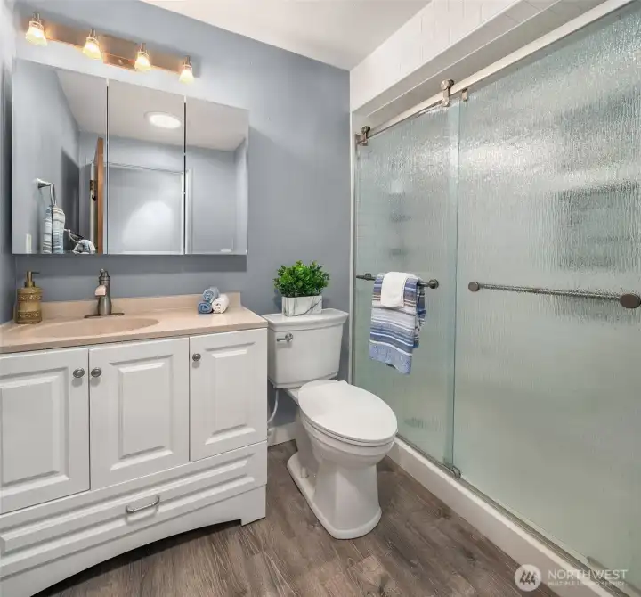 Updated bathroom and custom shower.