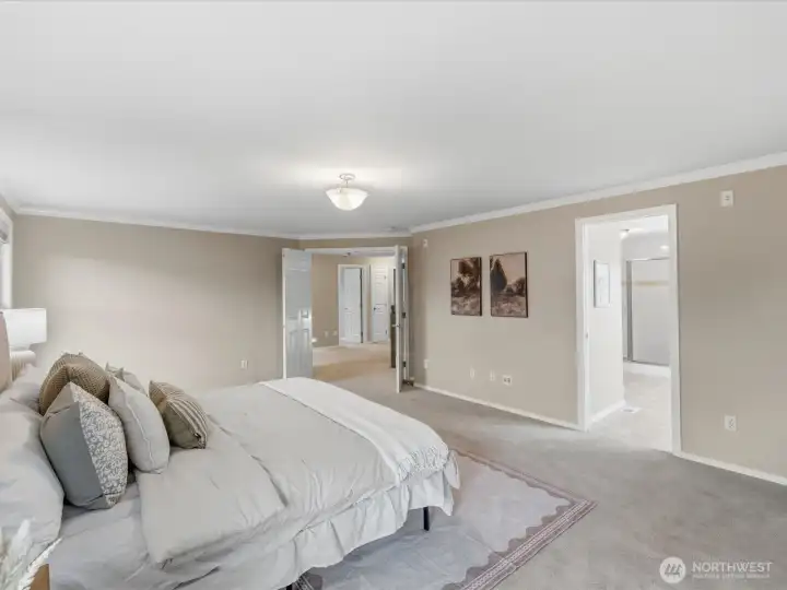 Luxurious primary suite features a five-piece bath and walk-in closet.