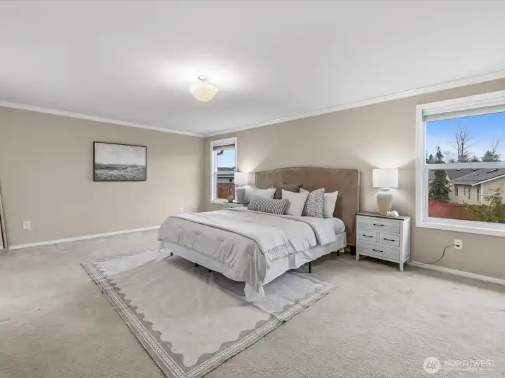 Spacious and elegant primary suite with refined touches.