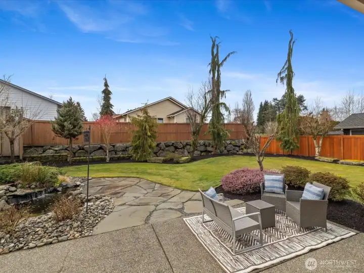 A backyard oasis designed for both peaceful solitude and lively gatherings.