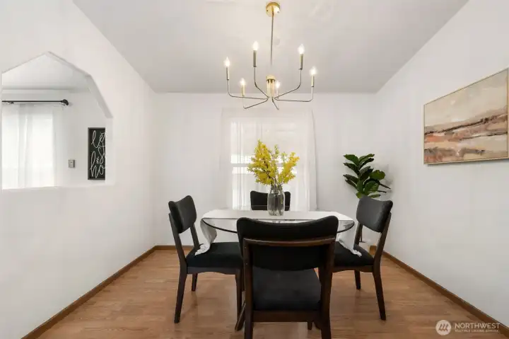Separate dining room adjacent to living and kitchen