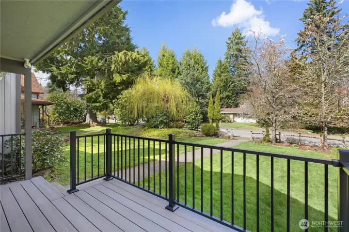 A welcoming front porch provides a perfect place to relax and enjoy the neighborhood setting.