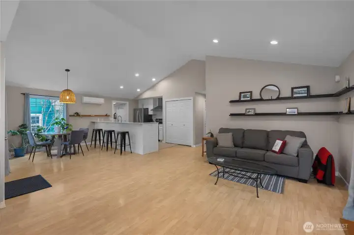 Open-concept layout connects the living, dining, and kitchen spaces with ease.