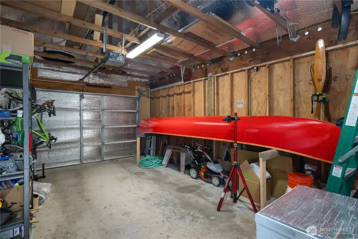 Garage interior provides flexible utility for projects, equipment, and additional storage needs.