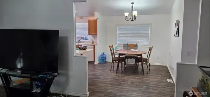 A view from the front door looking toward the dining room and kitchen.