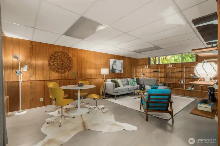 So many options for this gorgeous basement! Games night, movie night, cozy up to the fireplace.