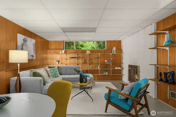 Notice the striking white brick detail surrounding the fireplace!
