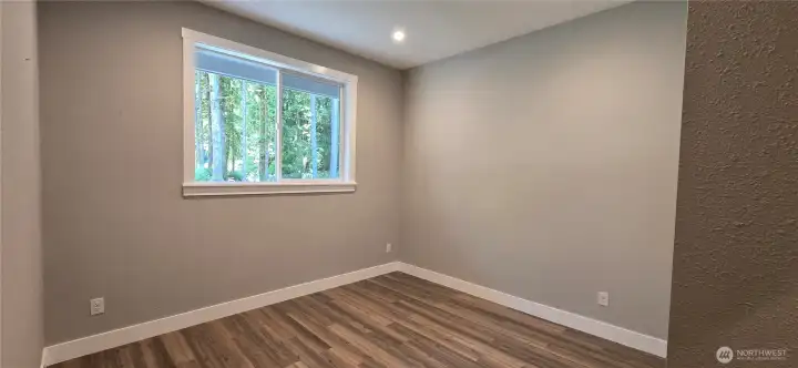 Bedroom 1 faces driveway-East