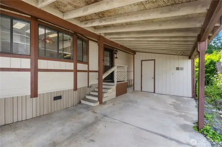Car port- leads into stairs into the mud room or onto the front deck