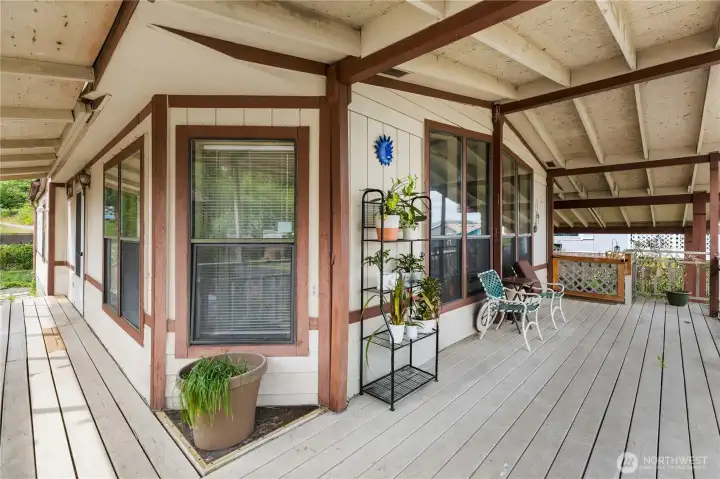front deck that wraps around front / side of house