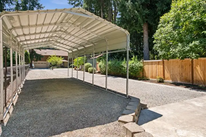 An installed metal carport provides exceptional covered parking for an RV, boat, trailer, or additional vehicles, making it easy to accommodate all the toys that come with a Lake Sawyer lifestyle.