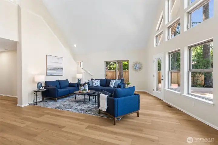 There is plenty of room in this fantastic waterfront-facing living room for additional furniture, if desired.