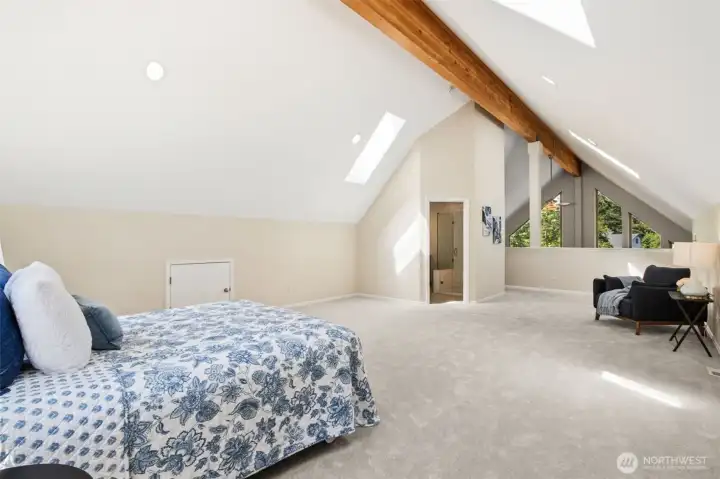 - With a skylight, plenty of room for a sitting area and fantastic outdoor views!