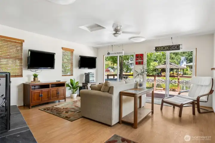 The boathouse! Excellent for use as a cabana & storage for outdoor play & boating equipment - or as an extension of the main house - game room, anyone? Enjoy its expansive waterfront deck and scenic views along navigable Covington Creek leading directly to Lake Sawyer