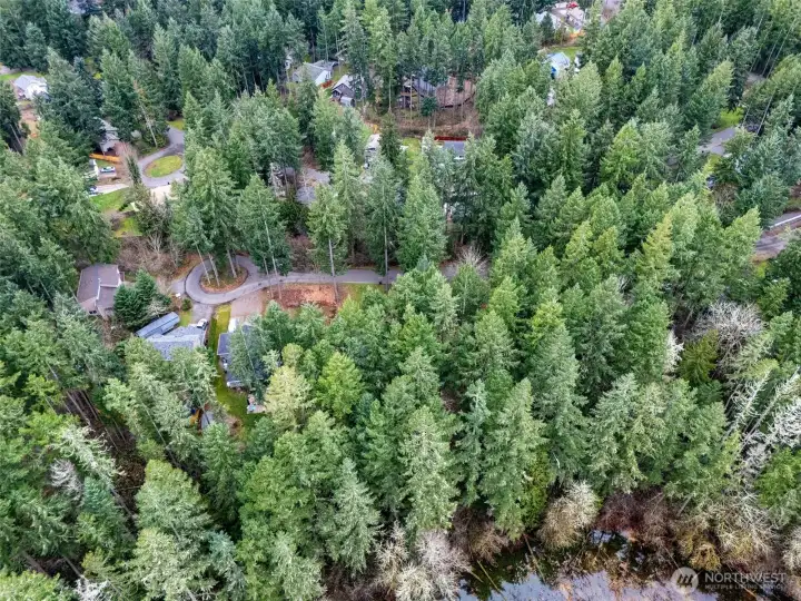 The Shy Half Acre Parcel, Lots 52-52, is Tucked Away on this Quiet, Paved Cul-de-Sac Road!