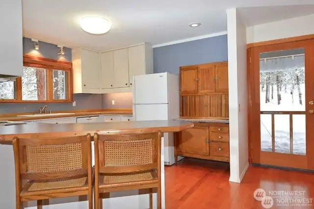 Bright Light Kitchen has great floor plan to access outside covered decks.