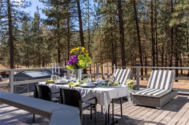 Gather here! wood decks around home extend living area. 2 Outbuildings for additional storage.