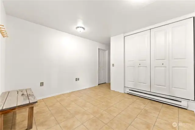 Entry ground level from 2 vehicle carport has excellent storage with huge coat and gear closet. Tiled floor. Electric heat baseboard.  Welcome your friends neighbors and four-legged in the spacious mud room entry. Useful in a recreational home and mountain lifestyle.