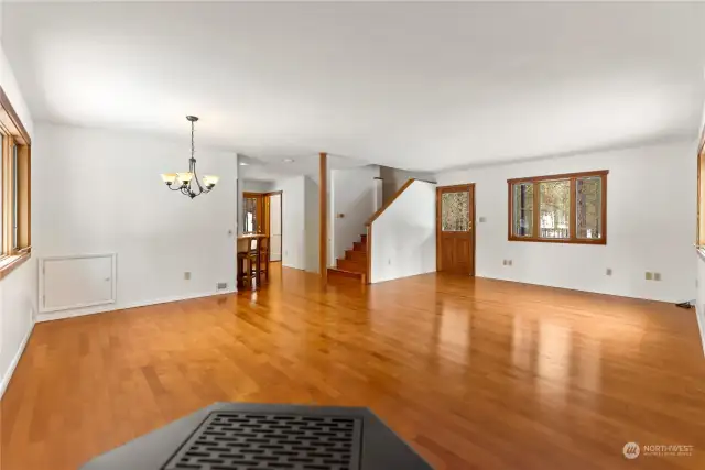 Spacious great room has hardwood Cherry floors. Heated with electric and pellet stove for a warm and cozy setting.