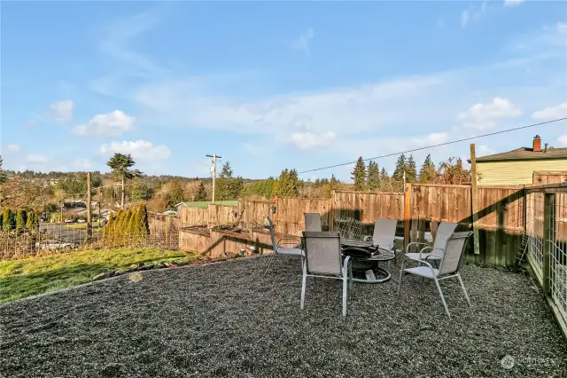 Not only is there the large deck, there is room for a firepit and sitting area.