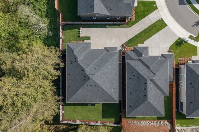 Overhead view of corner lot and long private driveway.