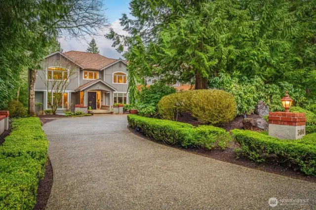This beautiful home features 6100* sq ft on a 1.8 acre lot backing to open space.