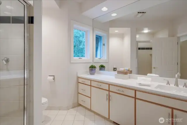 En-suite 3/4 bathroom of bonus room upstairs.