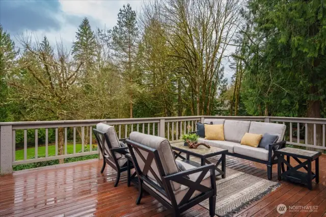 Extensive entertaining deck space with view of the gardens.