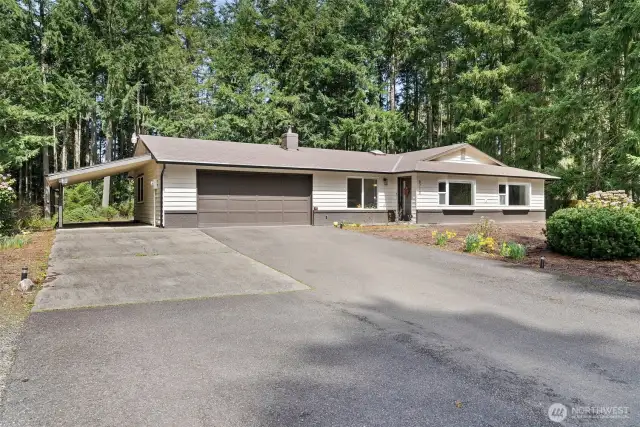 Enjoy a spacious lot with wooded views.