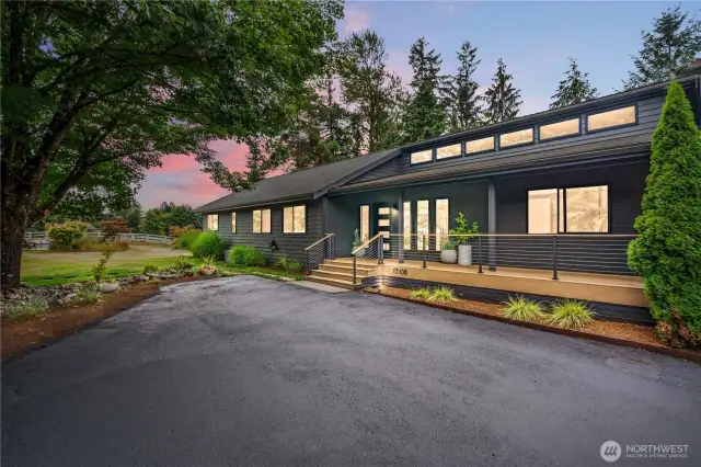 Main entrance welcomes you with sprawling front porch.
