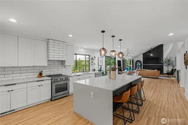 Enjoy cooking and entertaining in your custom kitchen with oversized slab island.