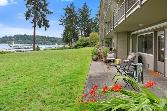 View of patio area and spacious common lawn area
