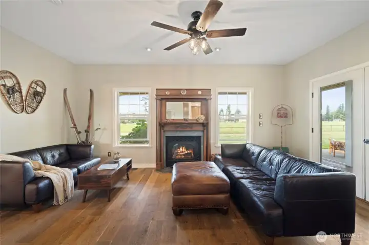 Living room with Gas fireplace and check out this amazing antique mantel from England!