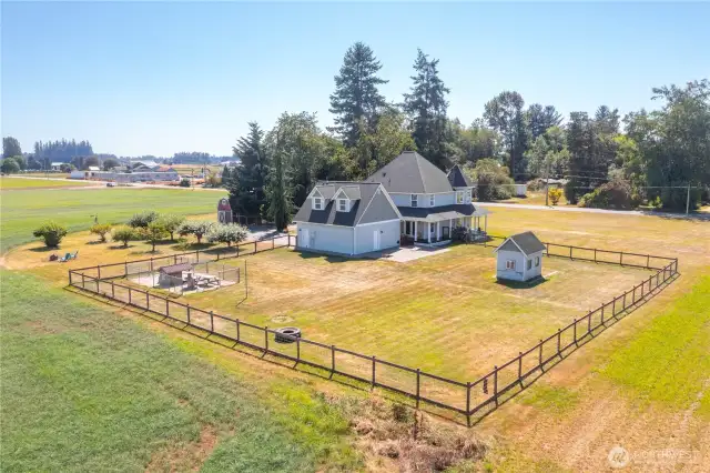 Fenced in back yard for pets, small animals.