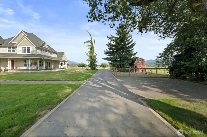 Paved drive with plenty of parking for guests or RV