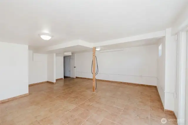 Spacious finished basement with versatile living space.