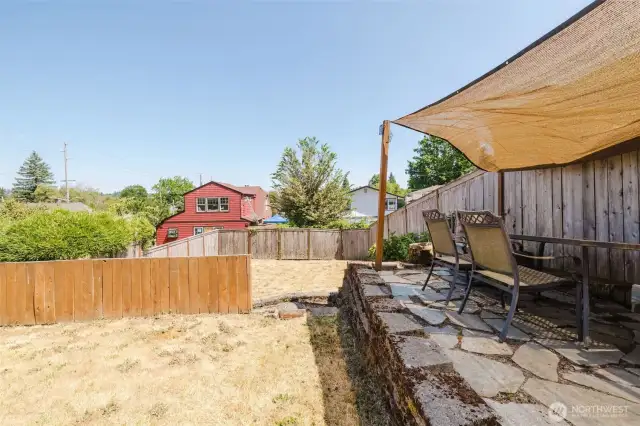 Large backyard perfect for entertaining and gardening.