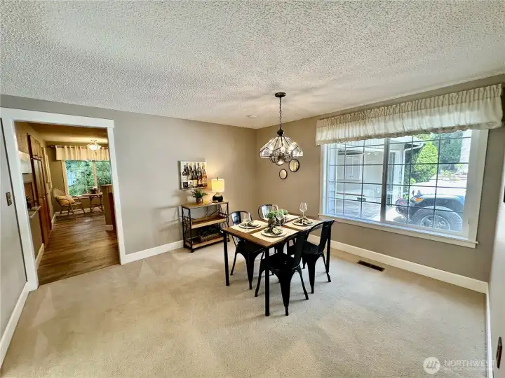 View of dining with easy access to kitchen.