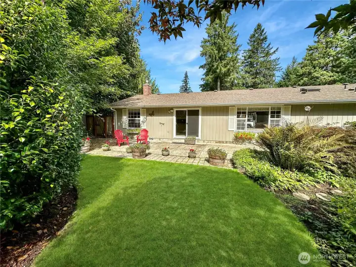 Rear view of home and large patio ideal for enteraining.