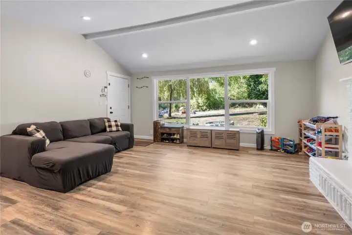 LVP flooring, huge living room window!