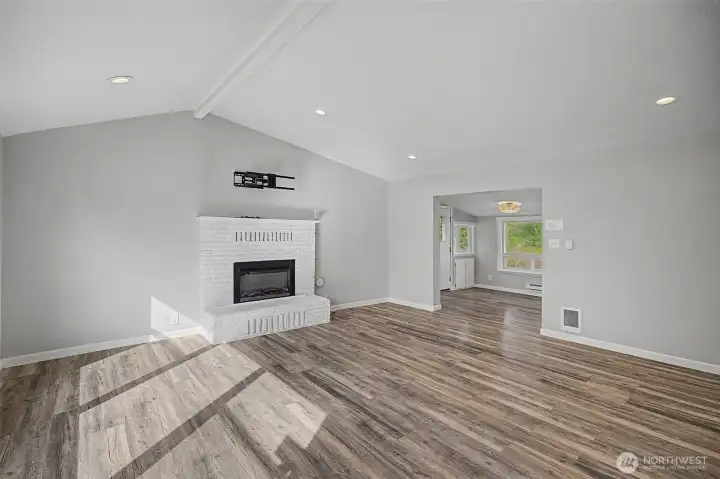 Enter in to your large living room with electric fireplace, perfect for cozy winter or summer nights.