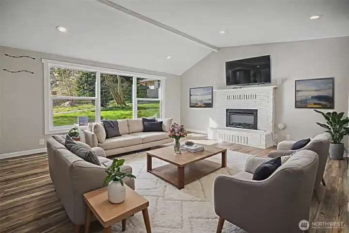 Virtually staged living room with huge windows giving off tons of natural lighting