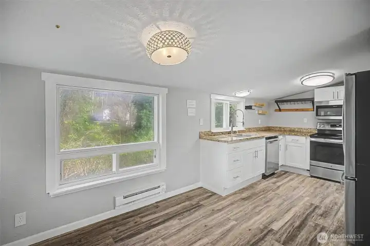 Another large window in the rear of the home letting in ample natural light