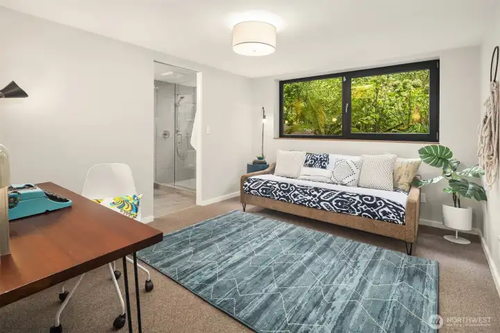 Ensuite second bedroom downstairs with European windows that open two different ways