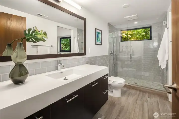 Two entrances to the 3/4 bath downstairs